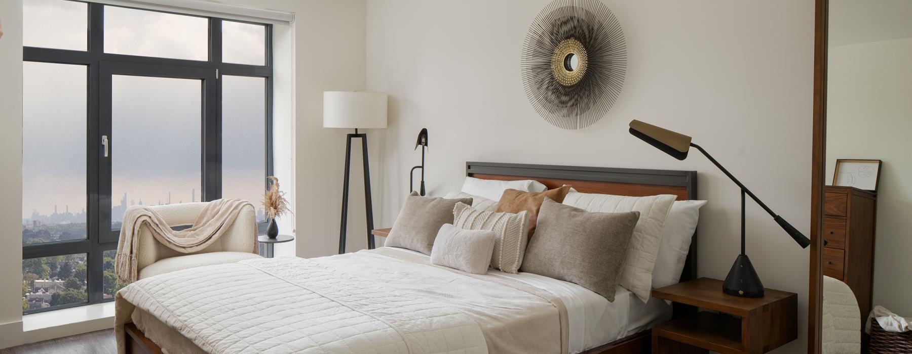 a bed with a large window