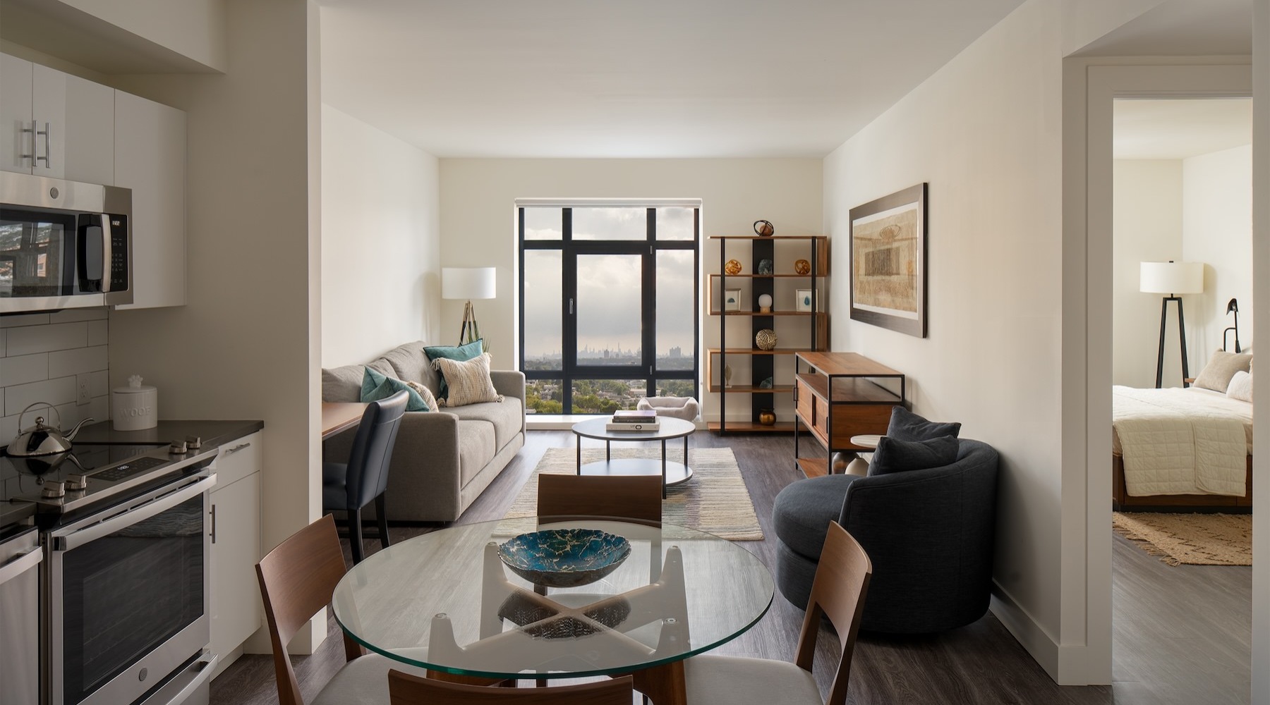 apartment with dining room table kitchen and living room